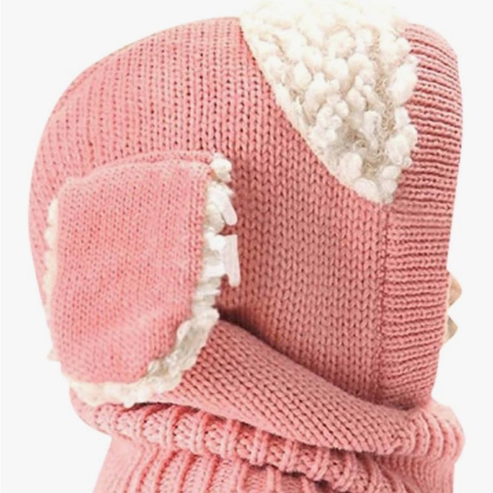 Used in great condition girls adorable winter hat with built in neck cover.